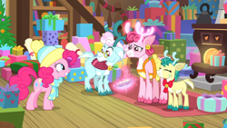 Size: 1600x900 | Tagged: safe, screencap, character:alice, character:aurora, character:bori, character:pinkie pie, species:deer, species:earth pony, species:pony, species:reindeer, episode:best gift ever, g4, my little pony: friendship is magic, clothing, cloven hooves, colored hooves, deer magic, female, glowing antlers, hat, magic, mare, present, telekinesis, the gift givers