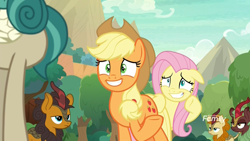 Size: 1920x1080 | Tagged: safe, screencap, character:applejack, character:autumn afternoon, character:cinder glow, character:fluttershy, character:pumpkin smoke, character:rain shine, character:summer flare, species:earth pony, species:kirin, species:pony, episode:sounds of silence, g4, my little pony: friendship is magic, background kirin, discovery family logo, female, grin, lidded eyes, male, mare, nervous, nervous grin, smiling, waving