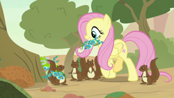 Size: 1280x720 | Tagged: safe, screencap, character:fluttershy, species:pegasus, species:pony, episode:sounds of silence, g4, my little pony: friendship is magic, female, flower, foal's breath, mare, mouth hold, squirrel