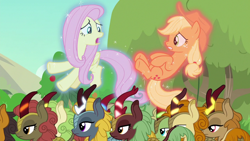 Size: 1280x720 | Tagged: safe, screencap, character:applejack, character:fern flare, character:fluttershy, species:earth pony, species:pegasus, species:pony, episode:sounds of silence, g4, my little pony: friendship is magic, female, glowing horn, lidded eyes, magic, mare, telekinesis