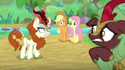 Size: 1280x720 | Tagged: safe, screencap, character:applejack, character:autumn blaze, character:cinder glow, character:fluttershy, character:summer flare, species:earth pony, species:kirin, species:pony, episode:sounds of silence, g4, my little pony: friendship is magic, angry, background kirin, blank eyes, cloven hooves, fangs, female, fire, floppy ears, furious, glowing eyes, imminent nirik, mare, river, stream