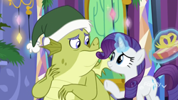 Size: 1920x1080 | Tagged: safe, screencap, character:rarity, character:sludge, species:dragon, species:pony, species:unicorn, episode:father knows beast, g4, my little pony: friendship is magic, christmas, christmas decoration, christmas ornament, clothing, decoration, discovery family logo, female, generosity, glowing horn, hat, hearth's warming, holiday, levitation, magic, magic aura, male, mare, present, santa hat, telekinesis, twilight's castle