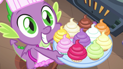 Size: 1280x720 | Tagged: safe, screencap, character:spike, species:dragon, episode:father knows beast, g4, my little pony: friendship is magic, apron, clothing, cupcake, cute, food, hopeful, looking up, male, naked apron, smiling, solo, tray
