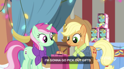 Size: 1334x750 | Tagged: safe, screencap, character:applejack, character:minty bubblegum, species:earth pony, species:pony, species:unicorn, episode:best gift ever, g4, my little pony: friendship is magic, clothing, duo, female, gumball machine, hat, holly the hearths warmer doll, mare, scarf, shopping bags