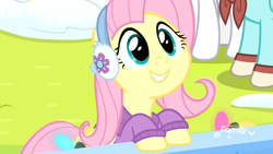Size: 1920x1080 | Tagged: safe, screencap, character:fluttershy, species:pegasus, species:pony, episode:best gift ever, g4, my little pony: friendship is magic, clothing, cute, earmuffs, female, happy, mare, scarf, shyabetes, smiling, snow, solo focus, sweater
