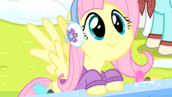 Size: 1920x1080 | Tagged: safe, screencap, character:fluttershy, species:pegasus, species:pony, episode:best gift ever, g4, my little pony: friendship is magic, clothing, cute, earmuffs, female, mare, shyabetes, smiling, snow, solo focus, spread wings, sweater, wings