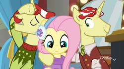 Size: 1920x1080 | Tagged: safe, screencap, character:flam, character:flim, character:fluttershy, species:pegasus, species:pony, species:unicorn, episode:best gift ever, g4, my little pony: friendship is magic, christmas sweater, clothing, cute, discovery family logo, female, flim flam brothers, hug, male, mare, melodramatic, necktie, scarf, shirt, shyabetes, stallion, sweater, trio, vest