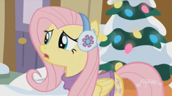 Size: 1350x756 | Tagged: safe, screencap, character:fluttershy, episode:best gift ever, g4, my little pony: friendship is magic, clothing, earmuffs, snow, solo, sweater, winter