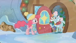 Size: 1348x768 | Tagged: safe, screencap, character:aurora, character:pinkie pie, species:deer, species:earth pony, species:pony, species:reindeer, episode:best gift ever, g4, my little pony: friendship is magic, clothing, cloven hooves, doe, door, duo, female, hat, house, log, logs, mare, raised hoof, scarf, shawl, snow, windy