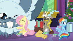 Size: 1920x1080 | Tagged: safe, screencap, character:discord, character:fluttershy, character:rainbow dash, species:draconequus, species:pegasus, species:pony, episode:best gift ever, g4, my little pony: friendship is magic, bowl, christmas, christmas tree, eating, eyes closed, female, food, hearth's warming tree, holiday, hug, male, mare, one eye closed, ornament, present, pudding, puddinghead's pudding, smiling, spoon, tree, wing hands, winterchilla, winterzilla