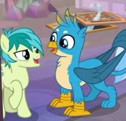Size: 447x429 | Tagged: safe, screencap, character:gallus, character:sandbar, character:silverstream, species:earth pony, species:pony, episode:what lies beneath, g4, my little pony: friendship is magic, chest fluff, cropped, cute, cutie mark, gallabetes, male, offscreen character, paws, smiling, tail
