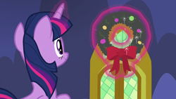 Size: 1280x720 | Tagged: safe, screencap, character:twilight sparkle, character:twilight sparkle (alicorn), species:alicorn, species:pony, episode:best gift ever, g4, my little pony: friendship is magic, bow, christmas wreath, female, magic, magic aura, mare, solo, telekinesis, wreath