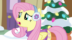 Size: 1280x720 | Tagged: safe, screencap, character:fluttershy, species:pegasus, species:pony, episode:best gift ever, g4, my little pony: friendship is magic, clothing, earmuffs, female, mare, open mouth, snow, solo, sweater