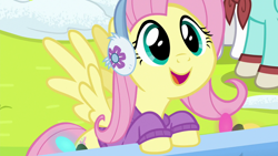 Size: 1280x720 | Tagged: safe, screencap, character:fluttershy, species:pegasus, species:pony, episode:best gift ever, g4, my little pony: friendship is magic, bottomless, clothing, cute, earmuffs, female, hnnng, mare, partial nudity, shyabetes, smiling, snow, solo focus, spread wings, sweater, sweatershy, wings