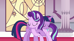 Size: 1136x640 | Tagged: safe, screencap, character:starlight glimmer, character:twilight sparkle, character:twilight sparkle (alicorn), species:alicorn, species:pony, species:unicorn, episode:shadow play, g4, my little pony: friendship is magic, bait, duo, duo female, eyes closed, female, hug, lesbian, mare, smiling