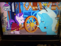 Size: 4160x3120 | Tagged: safe, screencap, character:starlight glimmer, character:trixie, species:pony, species:unicorn, episode:on the road to friendship, chinese, duo, female, hoo'far's wagon, irl, low quality, mare, photo, yoyotv