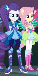 Size: 293x577 | Tagged: safe, screencap, character:fluttershy, character:pinkie pie, character:rarity, character:twilight sparkle, character:twilight sparkle (scitwi), species:eqg human, episode:super squad goals, g4, my little pony:equestria girls, boots, clothing, cropped, crossed arms, crystal guardian, crystal wings, duo, duo female, female, geode of fauna, geode of shielding, magical geodes, offscreen character, pants, ponied up, pony ears, shoes, skirt