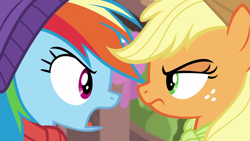 Size: 1280x720 | Tagged: safe, screencap, character:applejack, character:rainbow dash, species:pony, episode:best gift ever, episode:triple pony dare ya, g4, my little pony: friendship is magic, angry, close-up, duo, female, freckles, glare, mare, rivalry