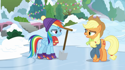 Size: 1280x720 | Tagged: safe, screencap, character:applejack, character:rainbow dash, species:earth pony, species:pegasus, species:pony, episode:triple pony dare ya, applejack's hat, clothing, cowboy hat, crossed hooves, crossed legs, female, folded wings, glare, hat, hoof boots, ice, mare, mittens, raised eyebrow, rivalry, scarf, shovel, snow, stetson, sweater, wings