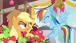 Size: 1280x720 | Tagged: safe, screencap, character:applejack, character:rainbow dash, species:pony, episode:triple pony dare ya, angry, apple, applejack is not amused, applejack's hat, clothing, cowboy hat, duo, eyes closed, female, flying, food, freckles, glare, hat, humiliation, laughing, mare, rivalry, spread wings, stetson, unamused, wings