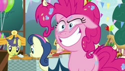Size: 1280x720 | Tagged: safe, screencap, character:bon bon, character:comet tail, character:pinkie pie, character:sweetie drops, episode:secrets and pies, g4, my little pony: friendship is magic, balloon, crazy face, crazy smile, faec, flag, smiling, table, tree