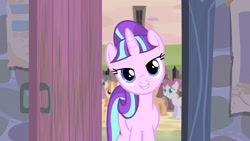 Size: 1920x1080 | Tagged: safe, screencap, character:rosemary, character:starlight glimmer, species:pony, species:unicorn, episode:the cutie re-mark, door, female, lidded eyes, looking at you, mare, our town, s5 starlight, smiling, solo focus