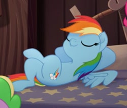 Size: 337x288 | Tagged: safe, screencap, character:rainbow dash, species:pegasus, species:pony, my little pony: the movie (2017), butt, cropped, crossed hooves, crossed legs, eyes closed, female, hooves behind head, lying down, mare, plot, reclining, relaxing, wings