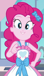 Size: 322x560 | Tagged: safe, screencap, character:pinkie pie, episode:the craft of cookies, g4, my little pony:equestria girls, apron, clothing, cropped, cute, diapinkes, female, grin, kitchen, looking at you, pointing, pointing at you, smiling, solo