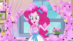 Size: 1280x720 | Tagged: safe, screencap, character:pinkie pie, episode:the craft of cookies, g4, my little pony:equestria girls, apron, clothing, cute, diapinkes, female, food, frosting, kitchen, open mouth, smiling, solo