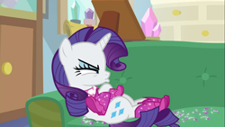 Size: 1665x937 | Tagged: safe, screencap, character:rarity, species:pony, species:unicorn, episode:the end in friend, g4, my little pony: friendship is magic, angry, boots, couch, cute, female, lying down, madorable, mare, narrowed eyes, pouting, raribetes, shoes, solo