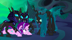 Size: 1440x809 | Tagged: safe, screencap, character:queen chrysalis, character:starlight glimmer, character:thorax, species:changeling, episode:to where and back again, g4, my little pony: friendship is magic, armor, changeling guard, changeling hive, changeling queen, disguise, disguised changeling, fake starlight glimmer, female, helmet