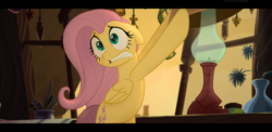 Size: 1920x937 | Tagged: safe, screencap, character:fluttershy, species:pegasus, species:pony, my little pony: the movie (2017), bags under eyes, bipedal, female, floppy ears, lamp, lampshade, mare, scared, solo, teeth