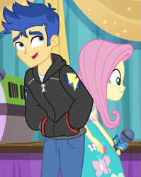 Size: 787x987 | Tagged: safe, screencap, character:flash sentry, character:fluttershy, episode:best in show: the pre-show, g4, my little pony:equestria girls, clothing, cropped, female, hands in pockets, hoodie, male, microphone, pants, smiling
