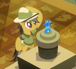 Size: 765x700 | Tagged: safe, screencap, character:daring do, species:pony, episode:read it and weep, g4, my little pony: friendship is magic, bipedal, clothing, cropped, female, hat, hoof on head, human pose, mare, pedestal, pith helmet, sapphire statue, smiling, solo, statue