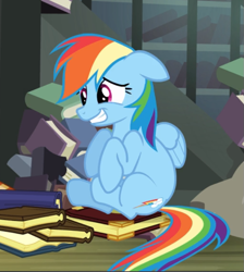 Size: 667x744 | Tagged: safe, screencap, character:rainbow dash, species:pegasus, species:pony, episode:daring don't, g4, my little pony: friendship is magic, book, cropped, female, floppy ears, mare, nervous grin, sitting, teeth