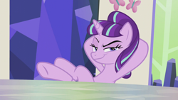 Size: 1280x720 | Tagged: safe, screencap, character:starlight glimmer, species:pony, species:unicorn, episode:the cutie re-mark, arm behind head, crossed hooves, evil grin, female, friendship throne, grin, hooves, hooves on the table, lidded eyes, look who's back, mare, oh boy, raised eyebrow, return, s5 starlight, slasher smile, smiling, smug, smuglight glimmer, solo, table, underhoof, welcome home twilight