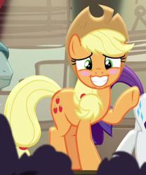 Size: 370x444 | Tagged: safe, screencap, character:applejack, species:pony, episode:made in manehattan, g4, my little pony: friendship is magic, applejack's hat, audience, bashful, blushing, clothing, cowboy hat, cropped, cutie mark, embarrassed, faec, female, hat, mare, raised hoof, showing teeth, solo focus, stetson, torn, waving