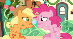 Size: 1606x857 | Tagged: safe, screencap, character:applejack, character:pinkie pie, species:earth pony, species:pony, episode:hearthbreakers, g4, my little pony: friendship is magic, duo, female, freckles, friendship express, hooves on hips, looking at each other, mare, pointing, raised hoof, sitting, underhoof, wavy mouth