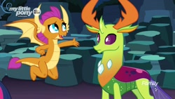 Size: 1920x1080 | Tagged: safe, screencap, character:smolder, character:thorax, species:changeling, species:dragon, species:reformed changeling, episode:uprooted, g4, my little pony: friendship is magic, changeling king, claws, dragoness, duo, female, flying, male, raised arm, raised eyebrow, spread wings, wings