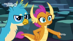 Size: 1920x1080 | Tagged: safe, screencap, character:gallus, character:smolder, species:dragon, species:griffon, episode:uprooted, g4, my little pony: friendship is magic, blue eyes, cave of harmony, chest feathers, claws, confused, cyan eyes, displeased, dragoness, duo, fangs, female, gallus is not amused, glare, hand on hip, head feathers, horns, male, raised eyebrow, slit eyes, smolder is not amused, teenaged dragon, teenager, unamused