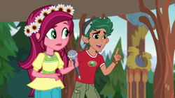 Size: 1920x1080 | Tagged: safe, screencap, character:gloriosa daisy, character:timber spruce, equestria girls:legend of everfree, g4, my little pony:equestria girls, camp everfree outfits, clothing, female, flower, flower in hair, geode of fauna, geode of shielding, geode of sugar bombs, geode of super speed, geode of super strength, magical geodes, male, microphone, shorts