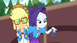Size: 1280x720 | Tagged: safe, screencap, character:applejack, character:rarity, episode:festival filters, g4, my little pony:equestria girls, cellphone, clothing, dress, hat, jacket, phone, shipping fuel, sunglasses