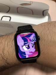 Size: 3024x4032 | Tagged: safe, screencap, character:twilight sparkle, character:twilight sparkle (alicorn), species:alicorn, species:pony, episode:horse play, g4, my little pony: friendship is magic, apple watch, cropped, faec, irl, photo, watch, wavy mouth