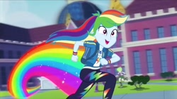 Size: 1280x720 | Tagged: safe, screencap, character:cherry crash, character:mystery mint, character:rainbow dash, episode:run to break free, g4, my little pony:equestria girls, background human, backpack, canterlot high, cherry crash, clothing, female, geode of super speed, magical geodes, pants, rainbow, solo, statue