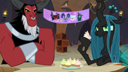 Size: 1920x1080 | Tagged: safe, screencap, character:cozy glow, character:grogar, character:lord tirek, character:queen chrysalis, species:centaur, species:changeling, species:pony, episode:frenemies, g4, my little pony: friendship is magic, angry, banner, bracer, changeling queen, crate, crossed arms, crown, cupcake, cute, cutealis, dessert, duo, duo male and female, eating, evil lair, female, fire, food, frown, grogar's lair, grumpy, hoof on cheek, jewelry, lair, madorable, male, mare, nose piercing, nose ring, piercing, pouting, queen chrysalis is not amused, regalia, tirebetes, tirek is not amused, unamused