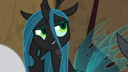Size: 1920x1080 | Tagged: safe, screencap, character:lord tirek, character:queen chrysalis, species:changeling, episode:frenemies, g4, my little pony: friendship is magic, better way to be bad, changeling queen, crown, cute, cutealis, evil grin, evil lair, eyeshadow, female, former queen chrysalis, grin, grogar's lair, hoof on cheek, insect wings, jewelry, lair, looking sideways, makeup, regalia, singing, slit eyes, smiling, solo focus, spread wings, squishy cheeks, wings