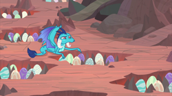 Size: 2100x1180 | Tagged: safe, screencap, character:princess ember, species:dragon, episode:sweet and smoky, g4, my little pony: friendship is magic, dragon egg, dragon lands, dragon lord ember, dragoness, egg, female, horns, laying on stomach, nest, prone, responsibility, solo, spread wings, talking to objects, wings, worried