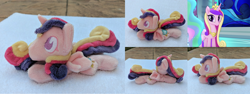 Size: 3176x1192 | Tagged: safe, screencap, character:princess cadance, species:alicorn, species:pony, beanie (plushie), chibi, crown, female, horn, irl, jewelry, lying down, mare, minky, missing accessory, no mouth, no nostrils, no pupils, photo, plushie, profile, prone, regalia, smiling, solo, sploot, toy, wings