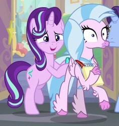 Size: 369x390 | Tagged: safe, screencap, character:november rain, character:silverstream, character:starlight glimmer, species:classical hippogriff, species:hippogriff, species:pony, species:unicorn, episode:student counsel, butt touch, cropped, duo focus, female, friendship student, hoof on butt, i need an adult, mare, offscreen character, out of context, pushing, rump push, wide eyes