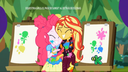 Size: 1366x768 | Tagged: safe, screencap, character:pinkie pie, character:sunset shimmer, equestria girls:sunset's backstage pass, g4, my little pony:equestria girls, best friends, cute, easel, geode of sugar bombs, magical geodes, messy, music festival outfit, paint, smiling